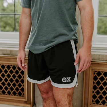 Theta ChiFraternity Black 7" Mesh Shorts with Greek letters.