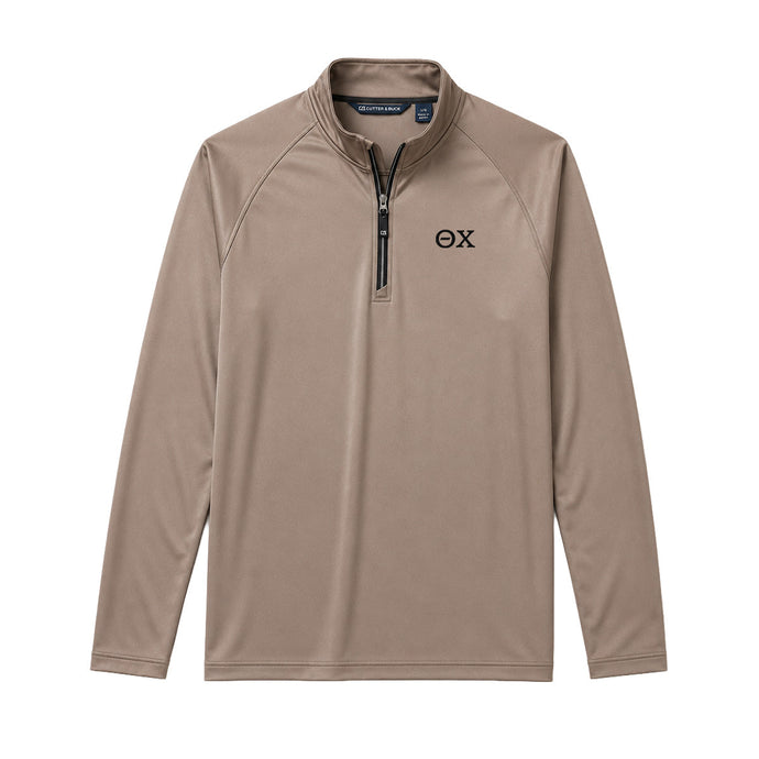 Mushroom Cutter & Buck Adapt quarter-zip pullover with black embroidered Theta Chi Greek letters on the left chest.