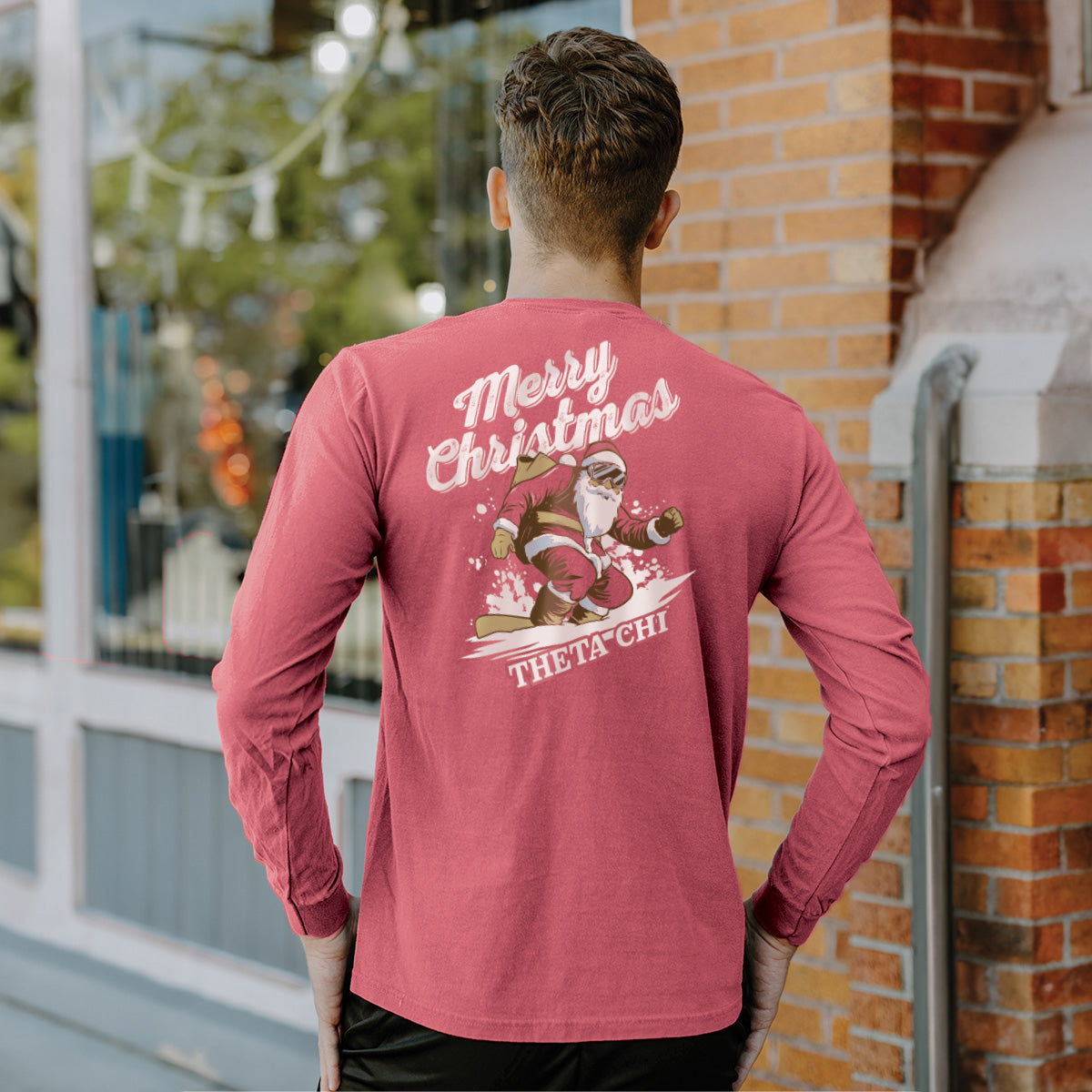 Theta Chi Holiday Shredding Santa Long Sleeve Tee